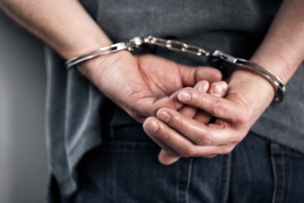 depositphotos 70908647-stock-photo-arrested-man-in-handcuffs